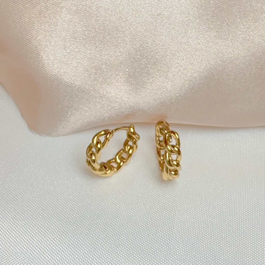 Gold plate Cuban twist hoops. Pierced.