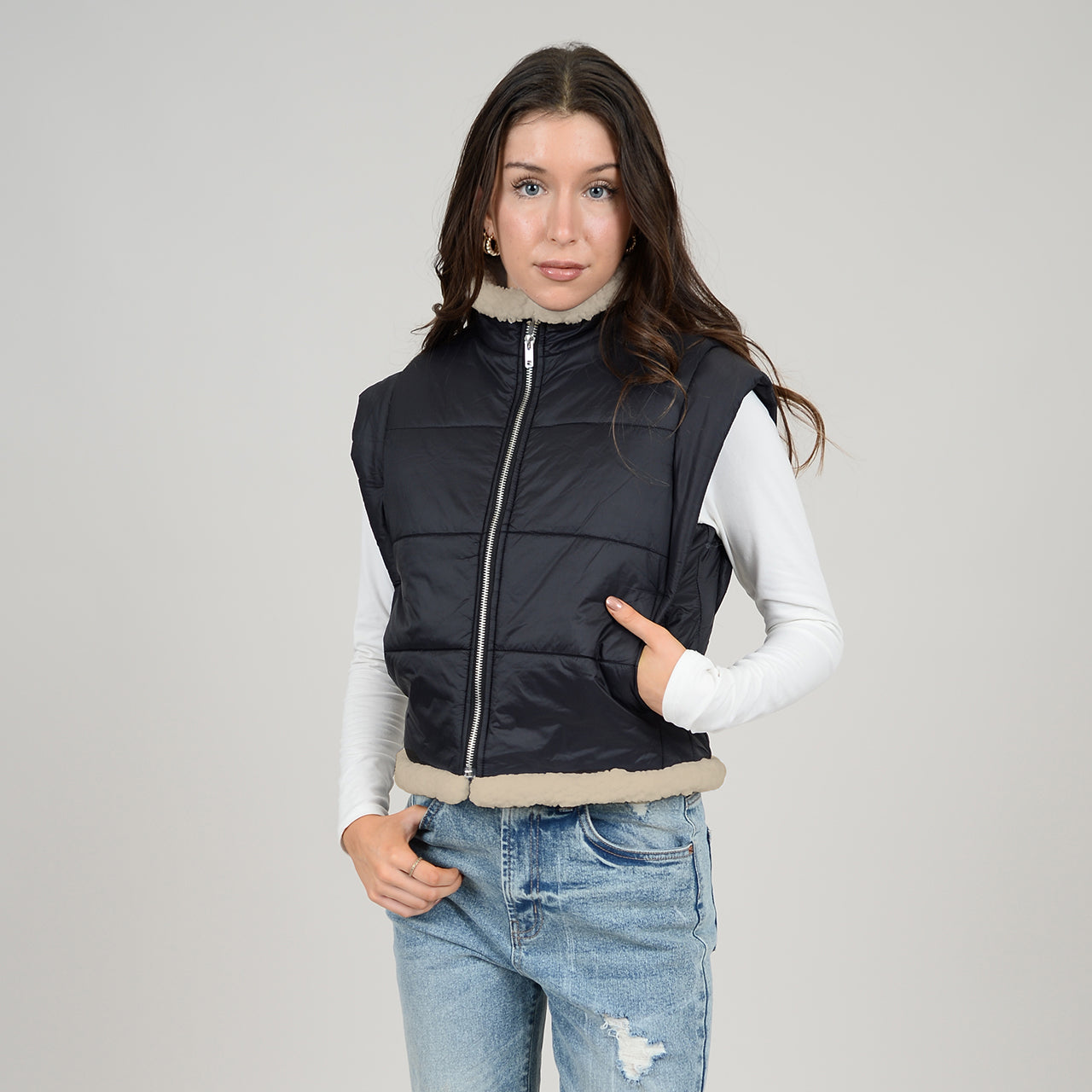 Puffer style vest with zip up closure black.